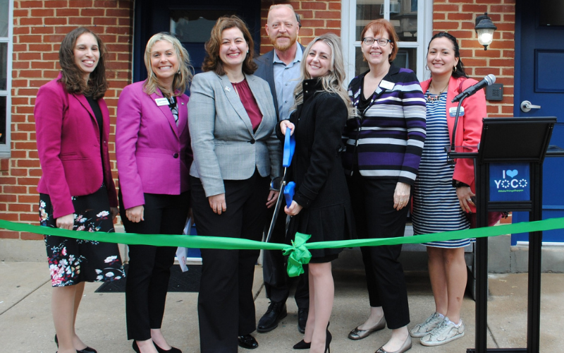 group of professionals at ribbon cutting 2.png